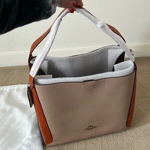 Brown leather coach bag, new never used